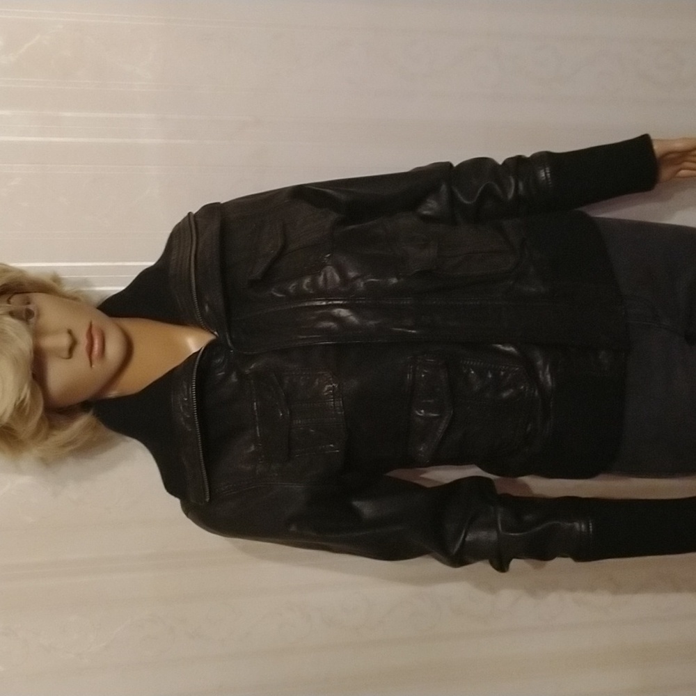 Buttery soft black lambskin LINE bomber jacket new and stylishly luxurious.